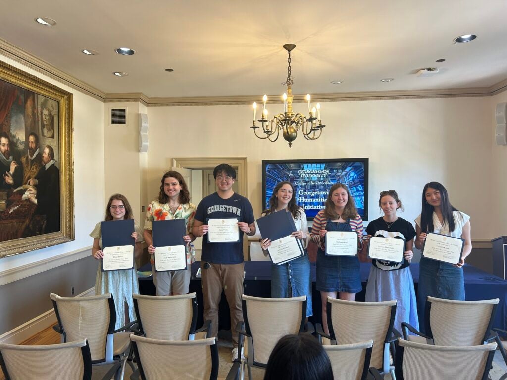 Students gather holding their certificates: from left to right, Elyza Bruce, Jack Markowitz, Hans Yang, Amelia Shotwell, Melinda Reed, Evelyn Blanchette, and Victoria Chen