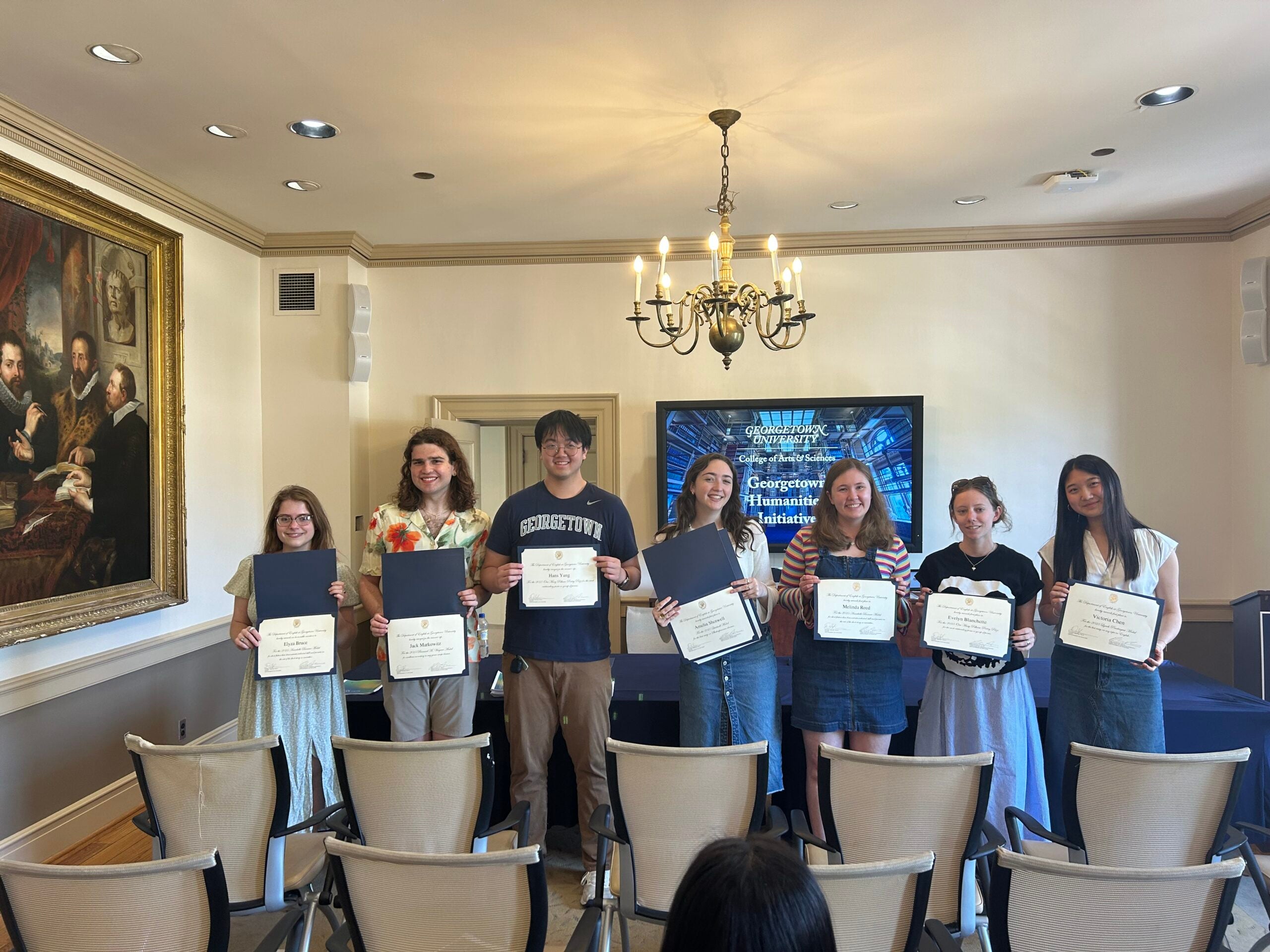 Students gather holding their certificates: from left to right, Elyza Bruce, Jack Markowitz, Hans Yang, Amelia Shotwell, Melinda Reed, Evelyn Blanchette, and Victoria Chen