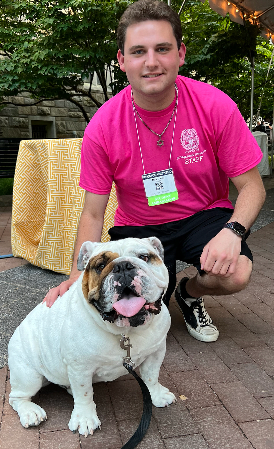 Headshot of Max Paley with Jack the Bulldog