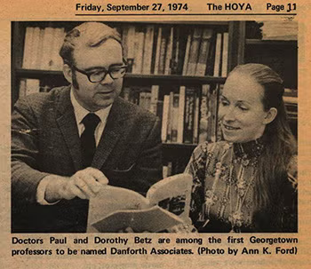 Profs. Paut and Dorothy Betz look over a book together in a clipping from a 1970s edition of The Hoya